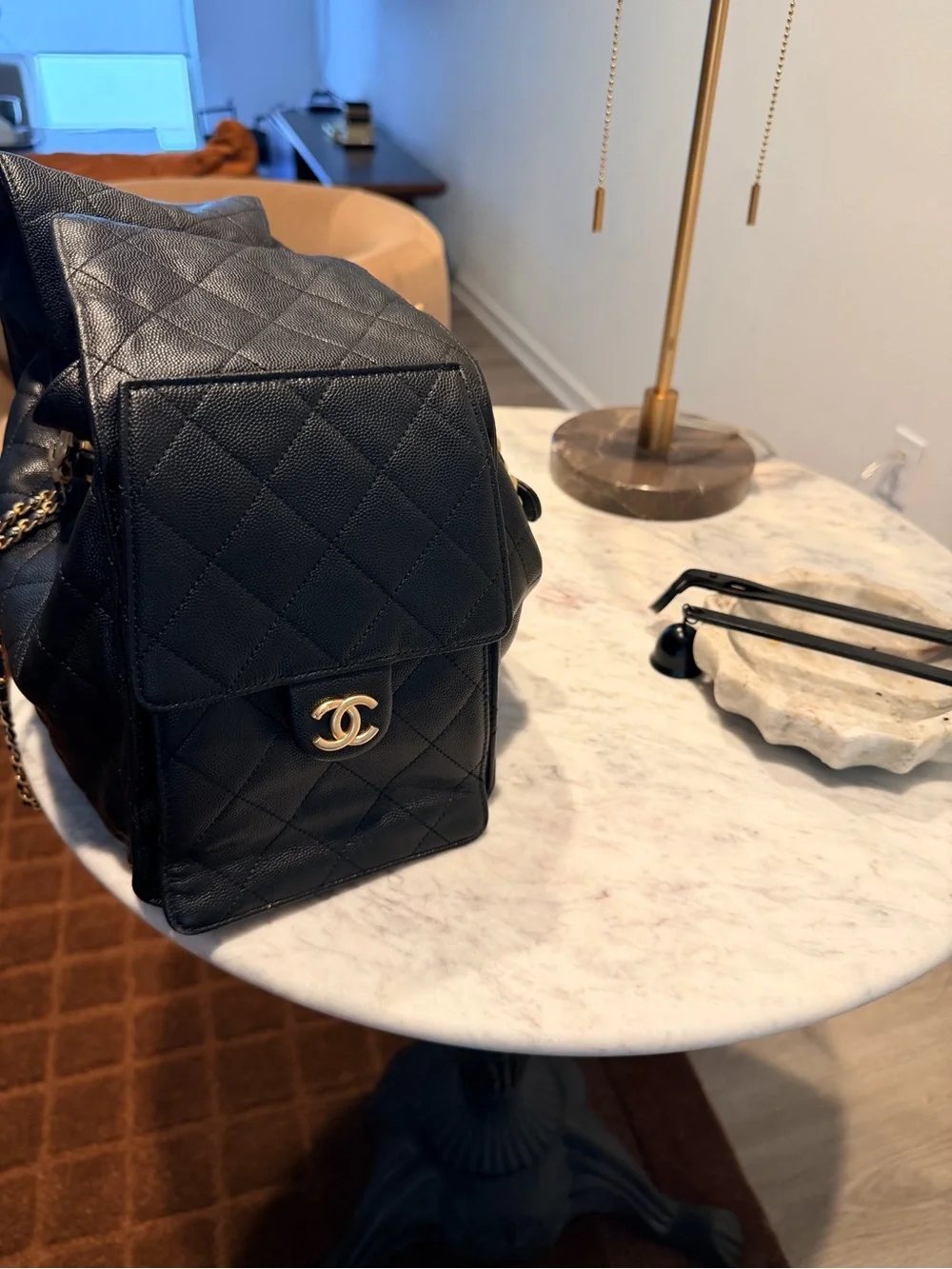 CHANEL Black Quilted Leather Shoulder Bag with Gold Chain and CC Logo
